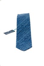 Picture of wool and silk tie light blue background